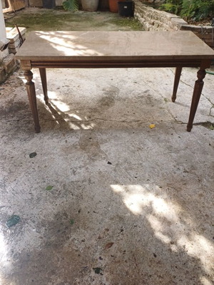 Antique table like new with carved wooden legs and marble