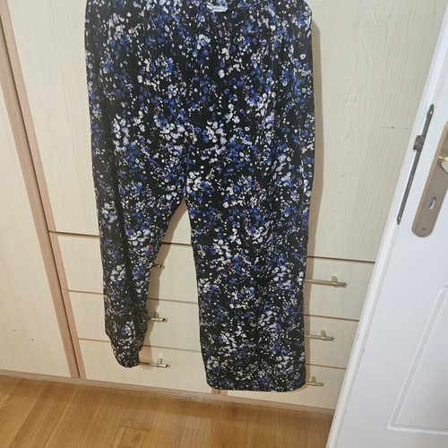 Regalinas pants like new, black floral with elastic waist, size M