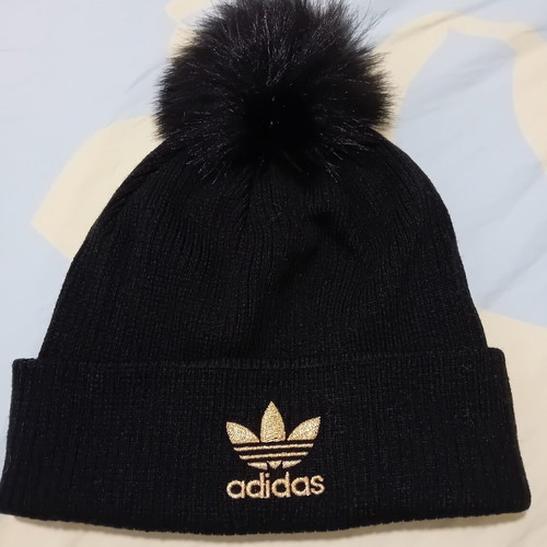Adidas Originals black beanie with pom pom and gold logo