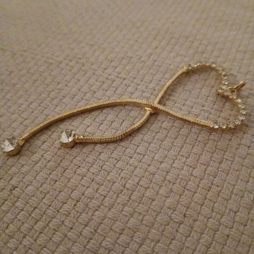 Gold heart pendant like new, gold-plated steel with rhinestones