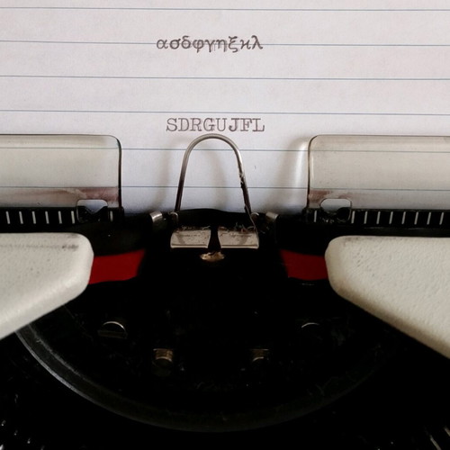 Olympia Traveller 1971 used typewriter with Greek and English keyboard