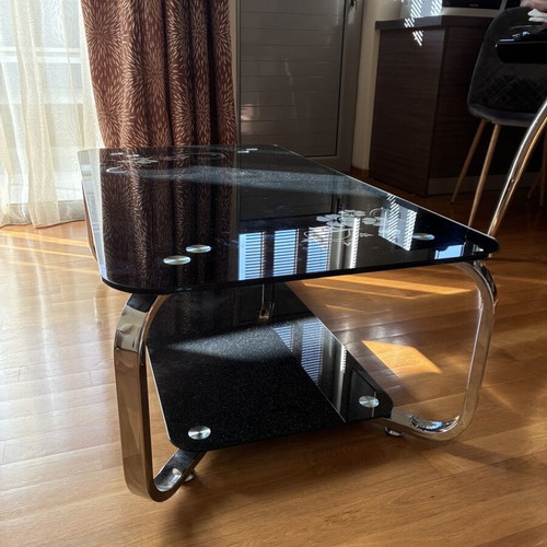 Low glass coffee table, black with floral design