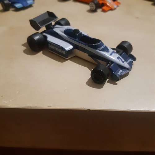 Majorette F1 Brabham 1984 with 3 vintage F1 toy cars