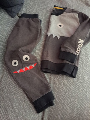 Kids' monster-themed grey tracksuit set used, sizes 2-3