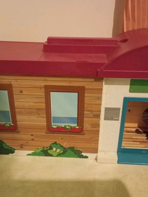 Toy used without furniture with stickers in good condition