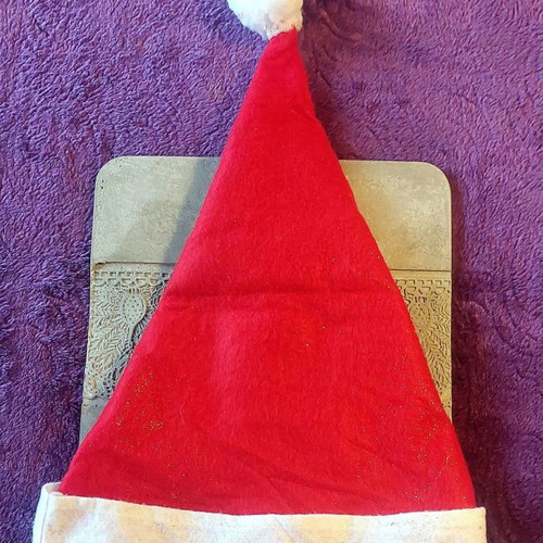 Santa Claus hat with gold glitter
