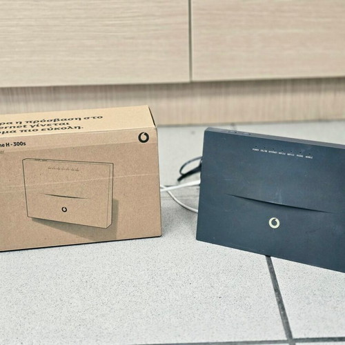 Vodafone H300s router with accessories in box