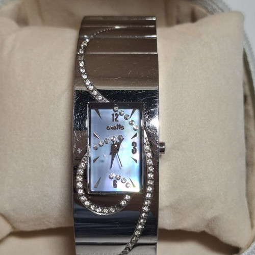 Oxette women's watch used with extra bracelet, silver