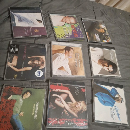 CDs of great performers like new, pack of 12