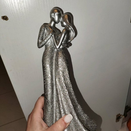 Decorative couple sculpture made of resin like new