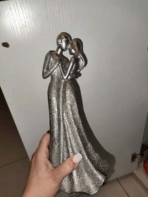 Decorative couple sculpture made of resin like new