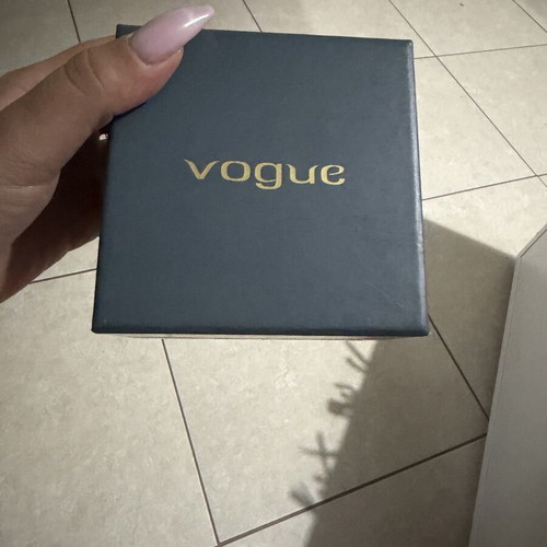 Vogue women's watch used, gold and silver colors