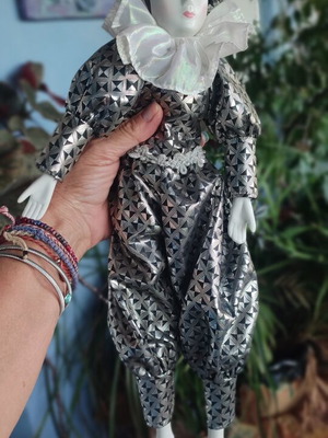 Porcelain Harlequin doll