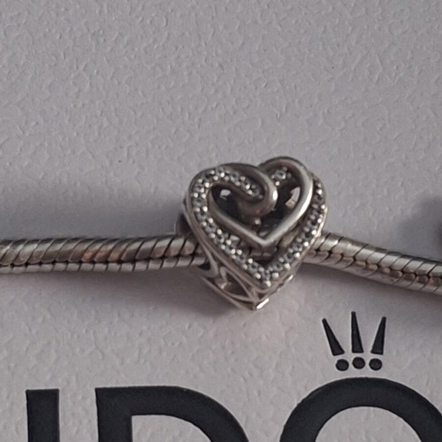 Pandora charm heart with linked hearts decorated with zircon stones, like new