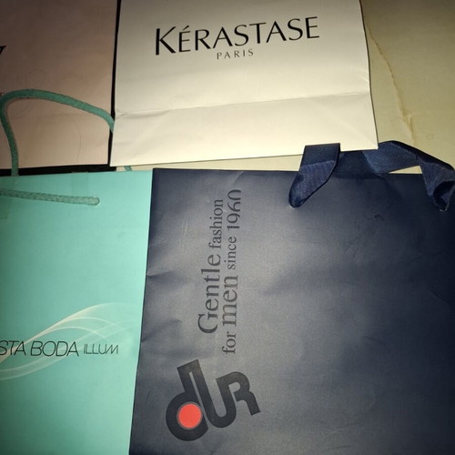 Paper branded bags used, pack of 11 pieces