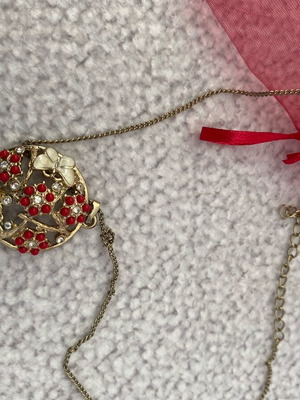 Gold pendant with butterflies and flowers like new