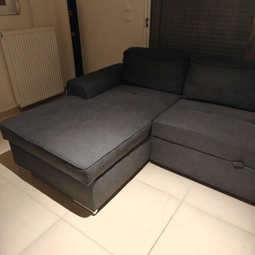 Corner sofa like new with storage and bed function