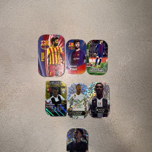 Football tazos used featuring Cristiano Ronaldo, Neymar and Gerard Piqué