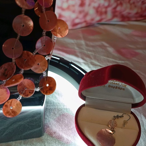 Layered handmade necklace with natural shells and beads