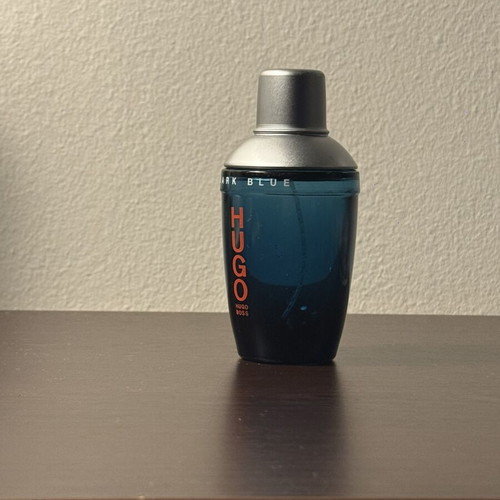 Hugo Boss Dark Blue cologne bottle used, empty glass