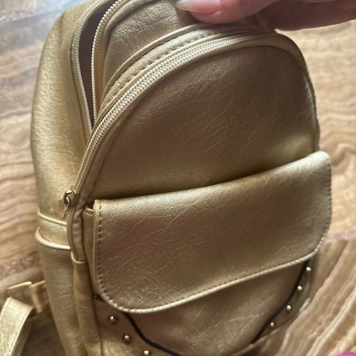 Backpack like new, gold color