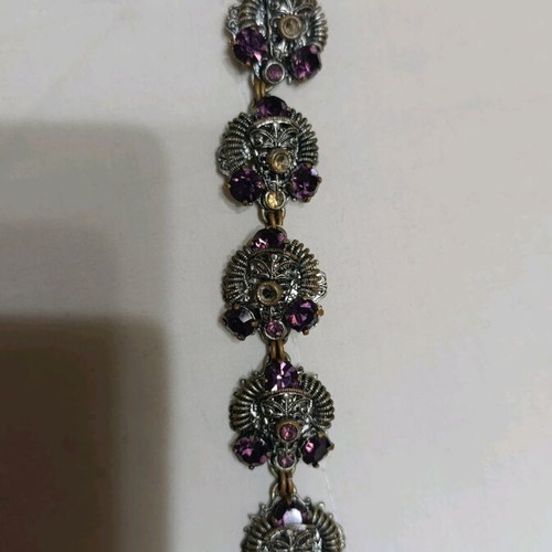 Vintage bracelet used with purple stones and silver details