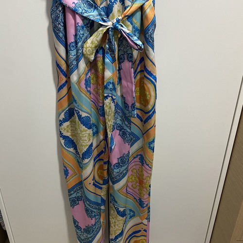 Printed jumpsuit like new with belt at waist, short sleeves, size M