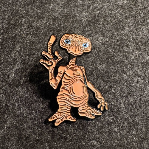 E.T. enamel pin brand new, black and beige
