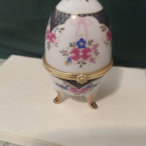 Decorative Faberge-style egg like new with floral motifs