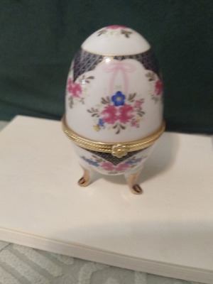 Decorative Faberge-style egg like new with floral motifs