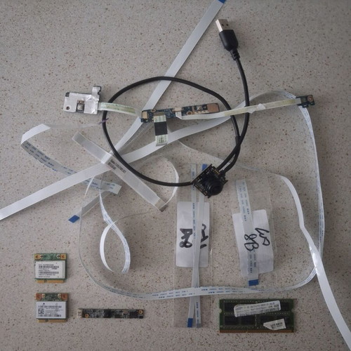 Laptop spare parts bundle with RAM, WiFi cards, cameras, cables