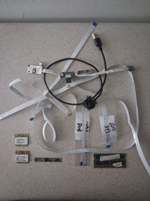 Laptop spare parts bundle with RAM, WiFi cards, cameras, cables