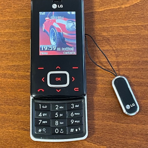 LG KG800 phone used, touch buttons, missing battery clip