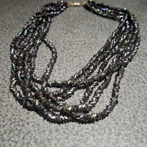 Torsade necklace used with iridescent carnival glass beads, 50cm