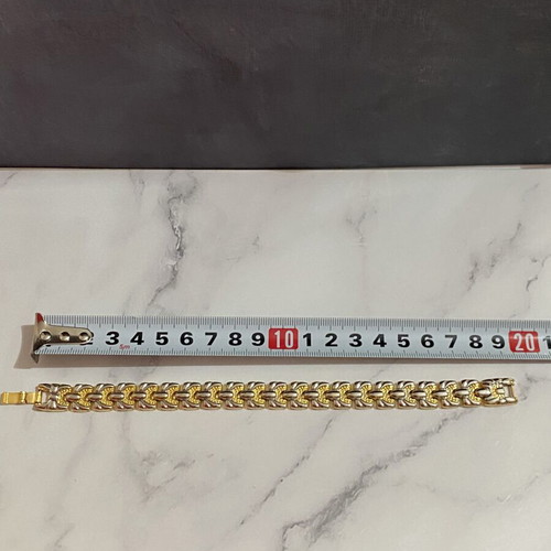 Bracelet in gold and silver colors like new