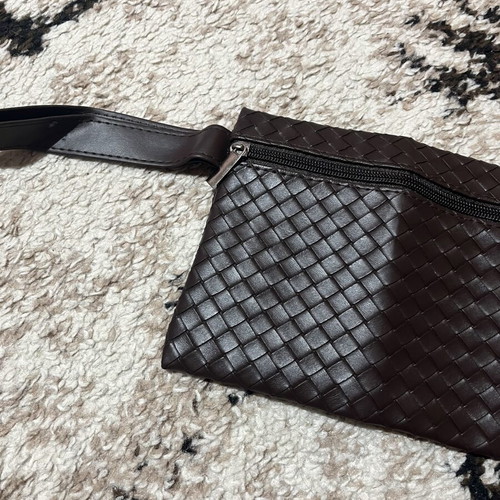 Brown knitted pouch with wrist strap like new