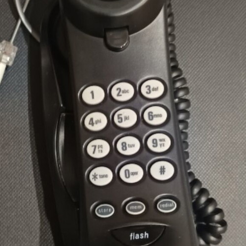 Wired landline phone like new, black, branded