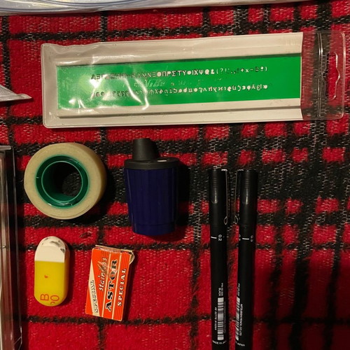 Professional drawing set used with tools and papers