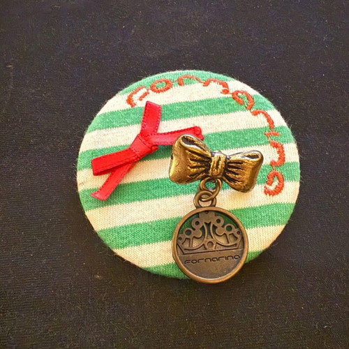 Fornarina badge and pin used, youthful sixties style