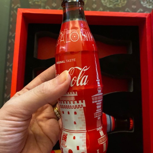 Collectible bottles and book 50 years Coca Cola new