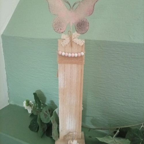 Wooden decorative item like new with metal butterfly
