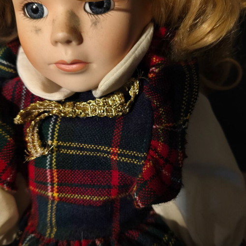 Porcelain doll used in music teacher role