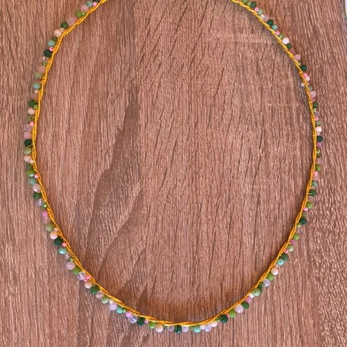 Handmade crown of gold wire with colorful beads