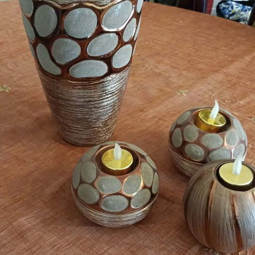 Brown vase and 3 brown tealight holders like new