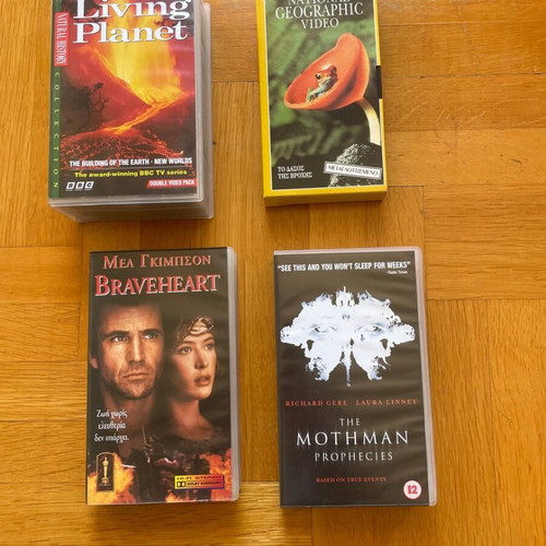 Used videocassettes pack of 17 with children’s and movie titles