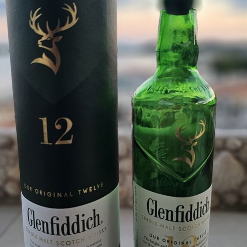Glenfiddich whisky bottle with case used, empty for decoration