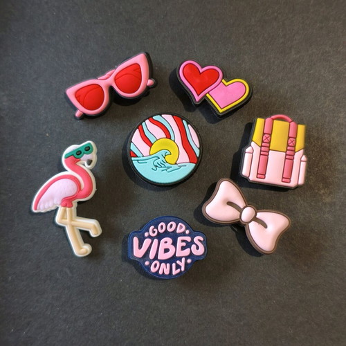 Crocs charms set brand new, pink and turquoise