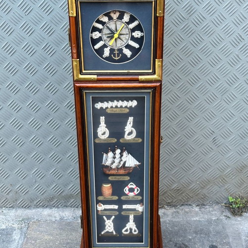 Decorative floor clock used with cabinet