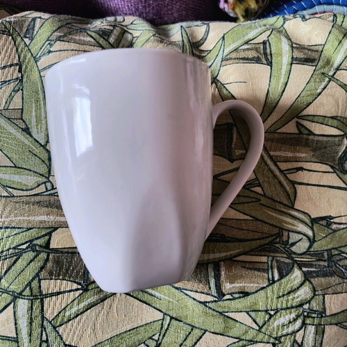 White mug used with small signs of wear
