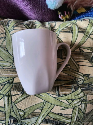 White mug used with small signs of wear